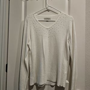 Sweater with rhinestones.